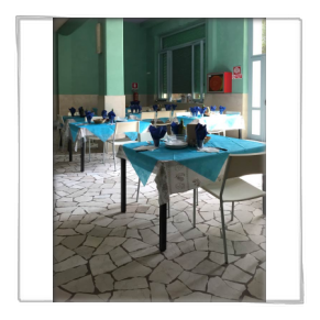 Sala da pranzo nel soggiorno estivo a Villa Marina