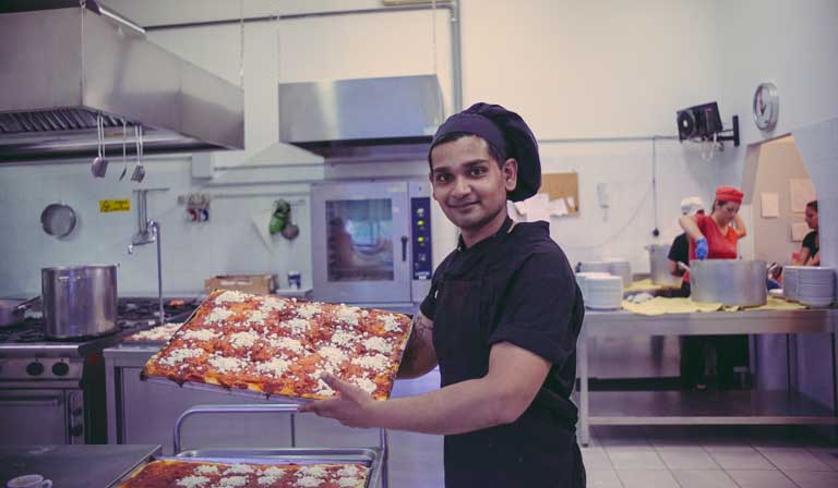 Cucina interna con cuochi professionisti